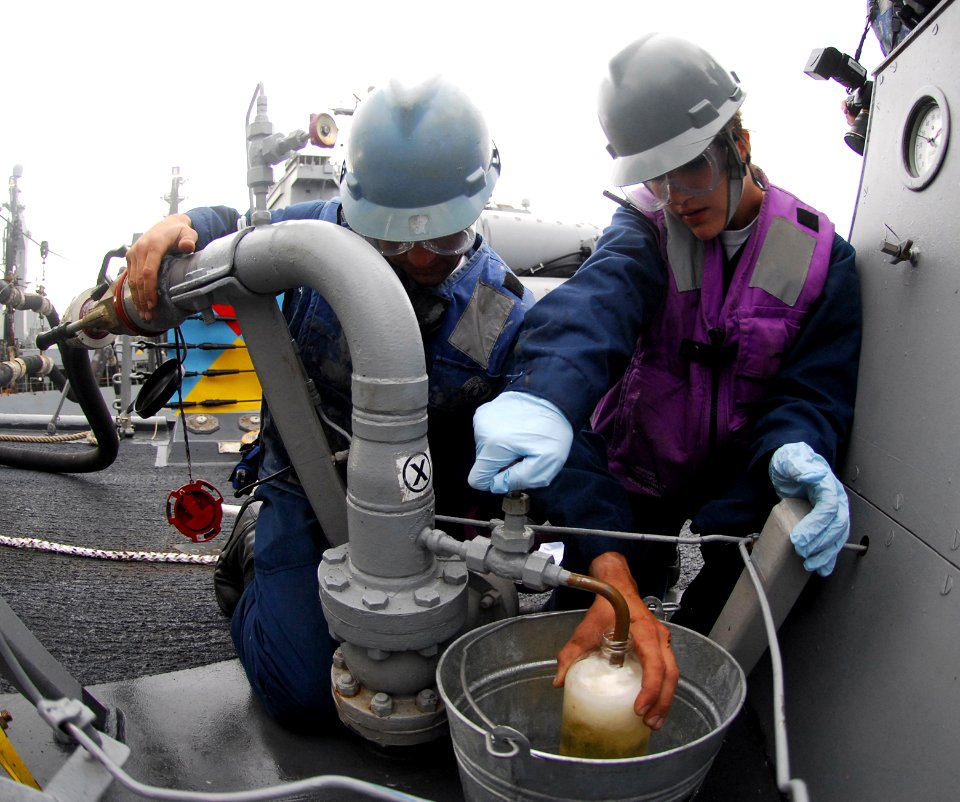 US Navy 100923-N-2855B-152 Cryptologic Technician 3rd Class Douglas Safratowich, left, and Gas Turbine System Technician Fireman Melissa Strain ob