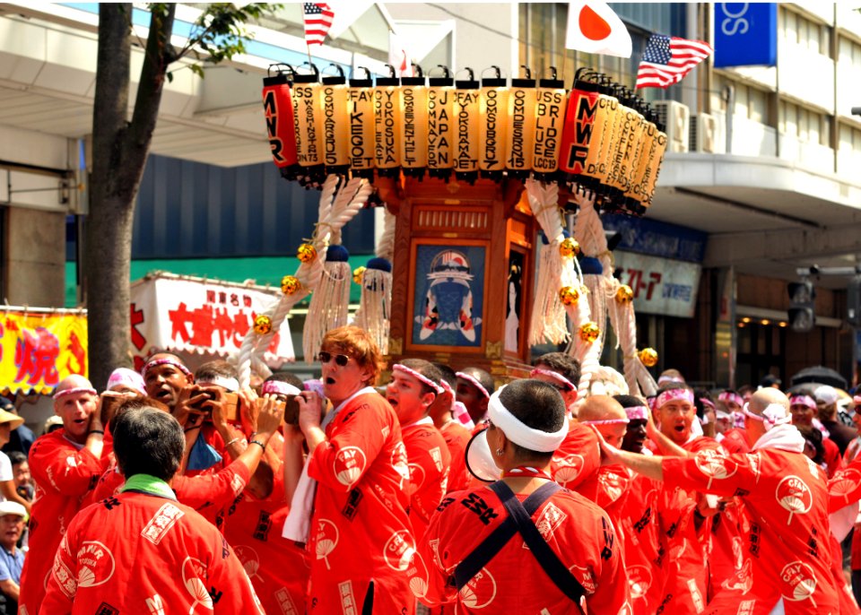 US Navy 100919-N-3215T-245 Residents from Commander, Fleet Activities Yokosuka including Sailors from various sea and shore commands carry the inst