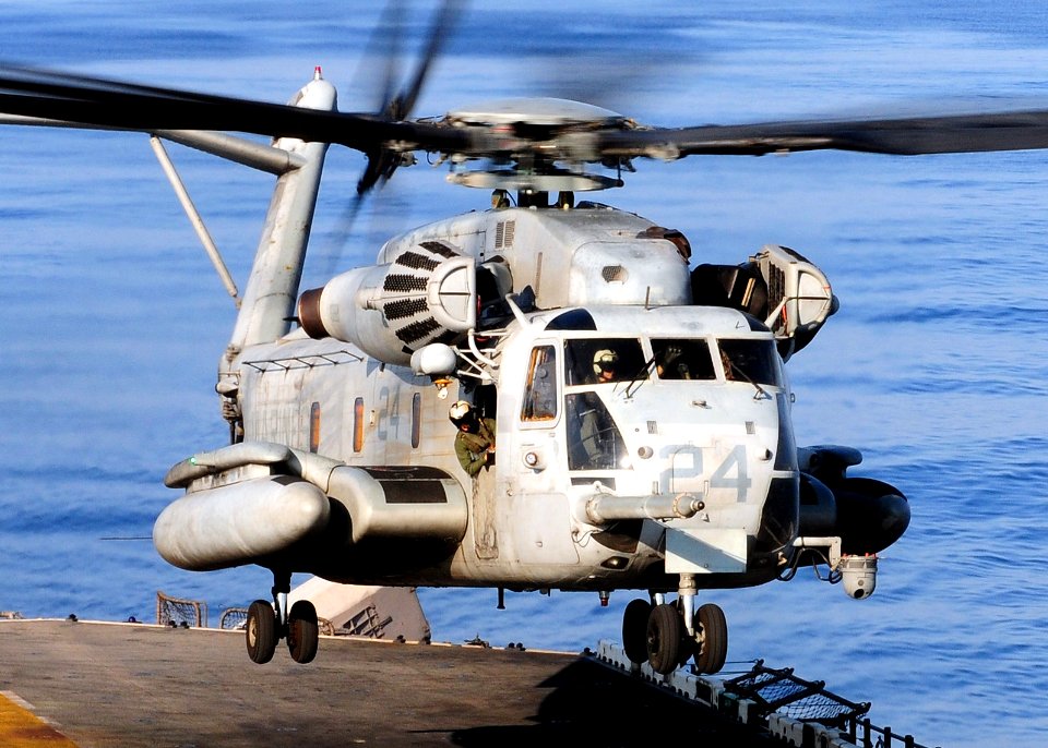 US Navy 100927-N-5538K-147 A CH-53E Sea Stallion helicopter assigned to Marine Medium Helicopter Squadron (HMM) 262, takes off from the flight deck