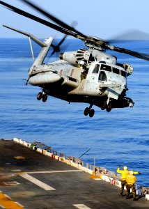 US Navy 100927-N-5538K-153 A CH-53E Sea Stallion helicopter assigned to Marine Medium Helicopter Squadron (HMM) 262, takes off from the flight deck