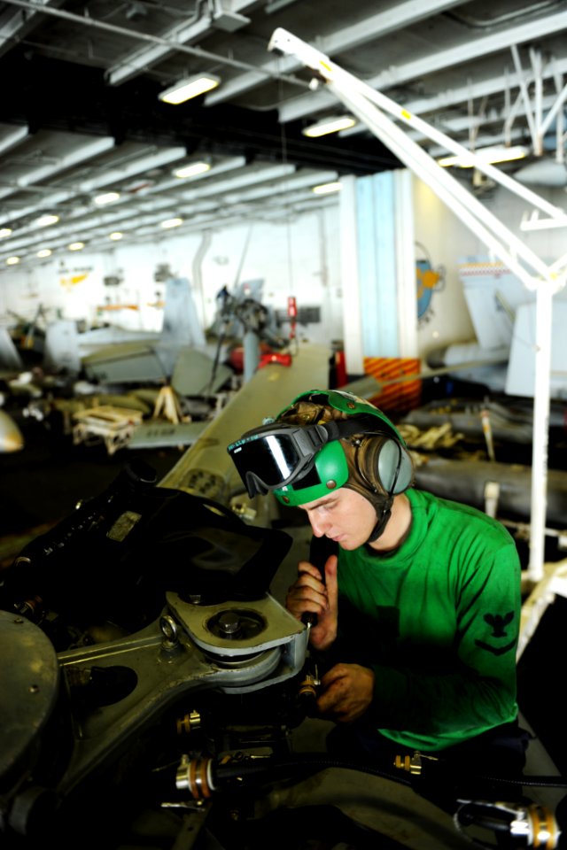 US Navy 100922-N-6362C-022 Aviation Electrician's Mate 3rd Class Dustin Landsiedel, assigned to the Dusty Dogs of Anti-submarine Helicopter Squadro