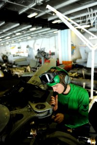 US Navy 100922-N-6362C-022 Aviation Electrician's Mate 3rd Class Dustin Landsiedel, assigned to the Dusty Dogs of Anti-submarine Helicopter Squadro