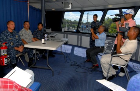US Navy 100921-N-4971L-011 Capt. Kurt Hedberg, left, mission commander of Southern Partnership Station 2010 participates in a press conference aboa