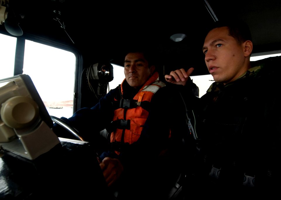 US Navy 100921-N-9095H-059 Boatswain's Mate 1st Class Edwin Mantilla, right, security force assistance mobile training team leader