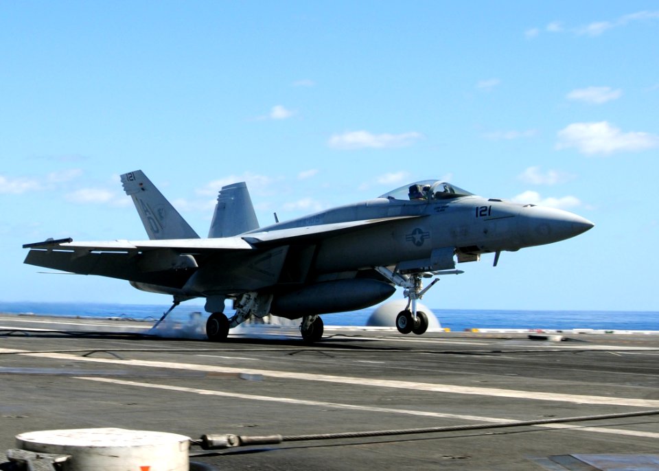 US Navy 100922-N-6632S-298 An F-A-18E Super Hornet assigned to Strike Fighter Squadron (VFA) 106 approaches the the aircraft carrier USS George H.W