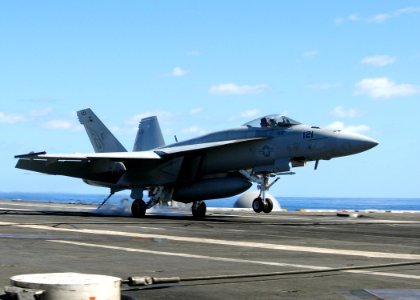 US Navy 100922-N-6632S-298 An F-A-18E Super Hornet assigned to Strike Fighter Squadron (VFA) 106 approaches the the aircraft carrier USS George H.W photo