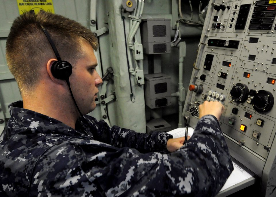 US Navy 100927-N-7680E-067 Fire Controlman 2nd Class Jacob Beebe, from Modesttown, Va., mans the local control panel of a Phalanx Close-In Weapons