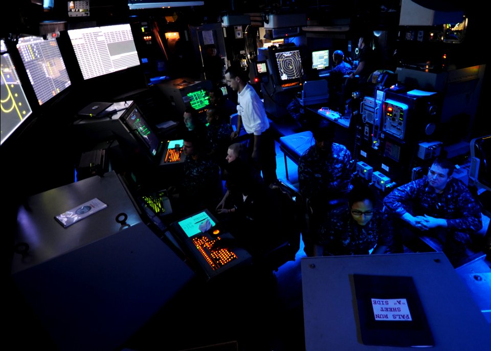 US Navy 100925-N-6427M-144 Air Traffic Controllers assigned to the carrier air traffic control center aboard the aircraft carrier USS Harry S. Trum