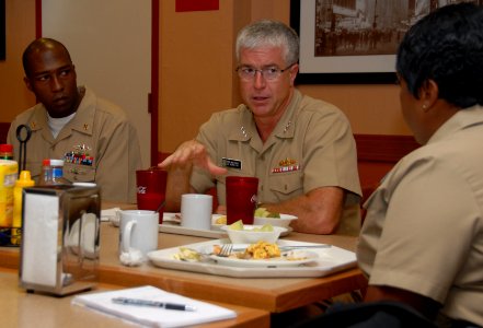 US Navy 100930-N-6764G-046 Vice Adm. Daniel P. Holloway, commander of U.S. 2nd Fleet, middle, discusses leadership responsibilities with Chief Elec