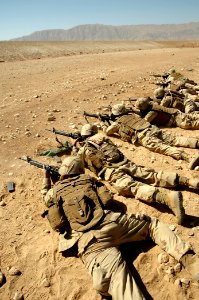 US Navy 101001-N-6436W-116 Seabees assigned to Naval Mobile Construction Battalion (NMCB) 40 conduct rifle range qualifications