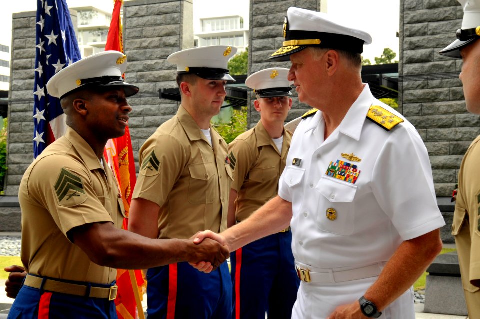 US Navy 100927-N-8273J-071 Chief of Naval Operations (CNO) Adm. Gary Roughead meets with Marines stationed at the U.S. Embassy in Singapore