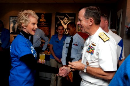 US Navy 101002-N-0696M-505 Chairman of the Joint Chiefs of Staff Adm. Mike Mullen greets Cindy McCain at Falcon Stadium