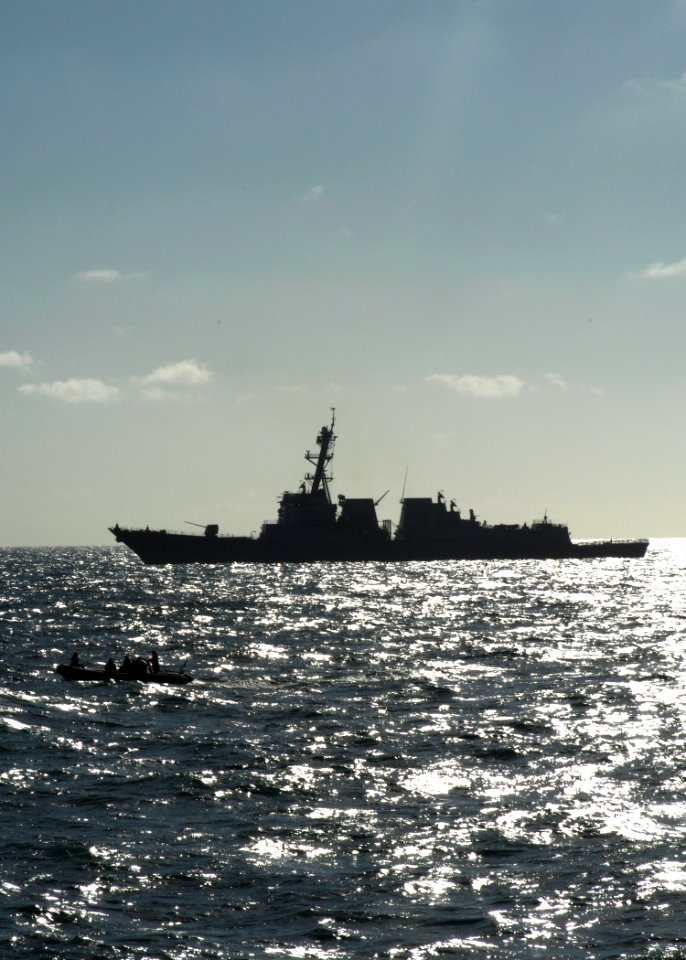 US Navy 100929-N-2855B-090 A rigid-hull inflatable boat patrols the water surrounding USS Stout (DDG 55) during maritime interdiction operations tr