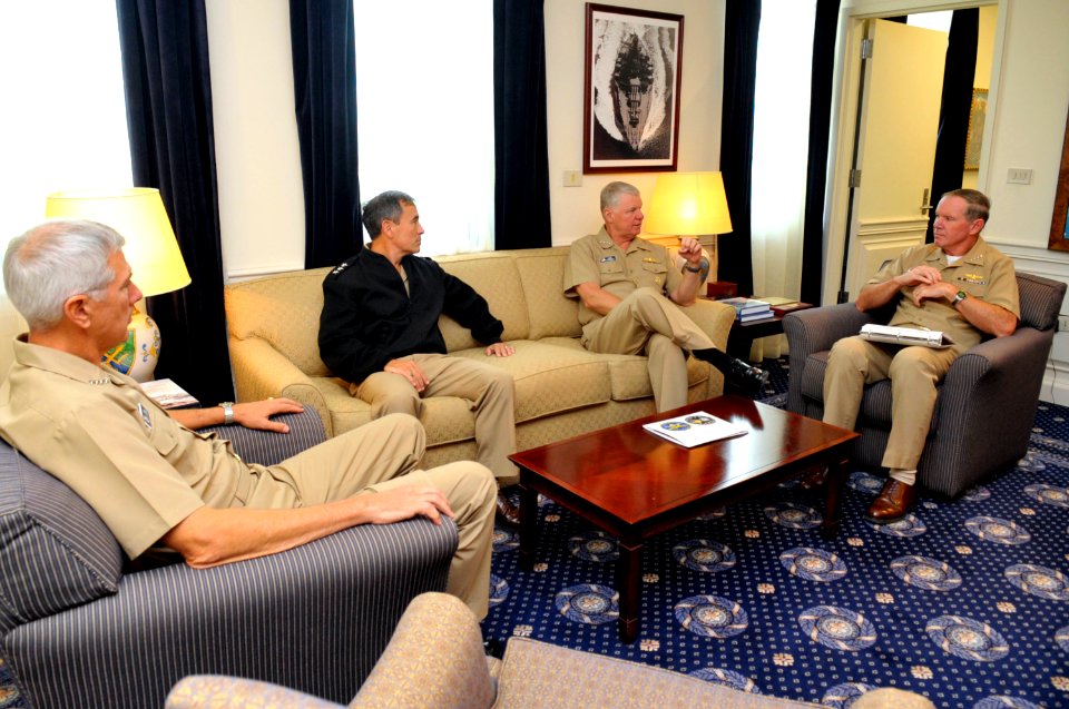 US Navy 101005-N-8273J-055 Chief of Naval Operations (CNO) Adm. Gary Roughead, center right, meets with senior leadership in Naples