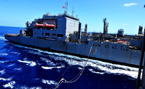 US Navy 100930-N-7948R-060 SNS Lewis and Clark (T-AKE 1) cruises alongside USS Pearl Harbor (LSD 52) during a replenishment at sea