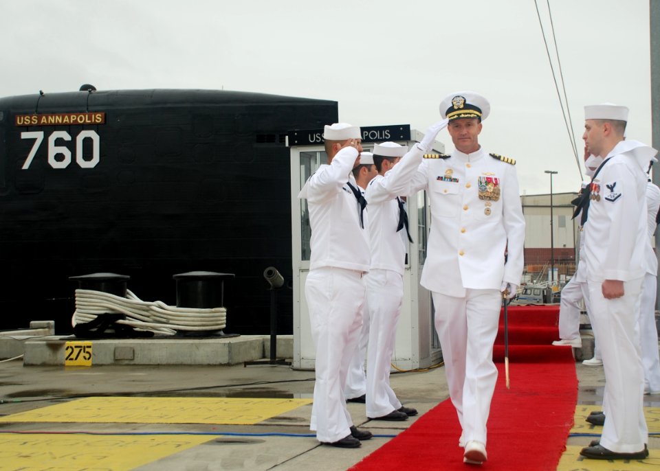 US Navy 100930-N-3090M-280 Capt. William Merz departs the change of command ceremony for Submarine Development Squadron 12