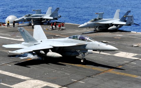 US Navy 101001-N-2821G-168 An F-A-18F Super Hornet assigned to the Blue Blasters of Strike Fighter Squadron (VFA) 2 lands on the flight deck of the