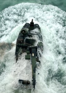 US Navy 101005-N-7680E-057 An amphibious assault vehicle (AAV) assigned to Alpha Company of the 2nd Assault Amphibian Battalion leaves the well dec