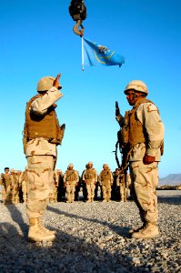 US Navy 101002-N-6436W-021 Equipment Operator 1st Class David Rivas reenlists at Camp Deh Dadi II in Northern Afghanistan