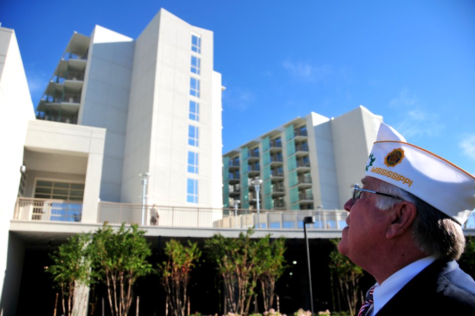 US Navy 101004-N-7367K-001 Kenneth McGuire, state commander of the American Legion Department of Mississippi, looks up at the refurbished Armed For