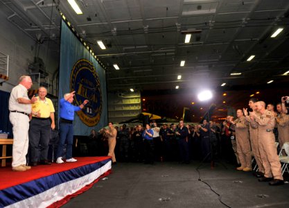 US Navy 101009-N-6003P-593 Retired astronauts Neil Armstrong, Capt. Jim Lovell, and Capt. Gene Cernan receive a standing ovation from Sailors and M