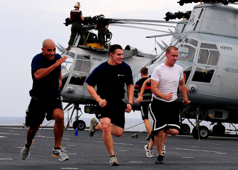 US Navy 101006-N-5538K-076 Marines assigned to the 31st Marine Expeditionary Unit (31st MEU) exercise on the flight deck of the forward-deployed am