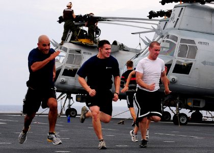US Navy 101006-N-5538K-076 Marines assigned to the 31st Marine Expeditionary Unit (31st MEU) exercise on the flight deck of the forward-deployed am