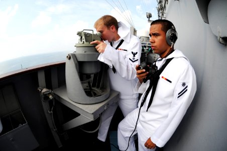 US Navy 101007-N-7191M-002 Sailors stand bearing taker watch on the signal bridge aboard the aircraft carrier USS George Washington (CVN 73)