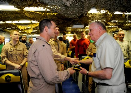 US Navy 101009-N-3705H-015 Cmdr. Chad Vincelette, executive officer of the Swordsmen of Strike Fighter Squadron (VFA) 32, gives a Swordsmen ball ca