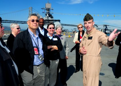 US Navy 101008-N-3570S-179 Maj. Dan Mcguire, assigned to Marine Light Attack Helicopter Squadron (HMLA) 367, gives a tour of the Navy's newest amph