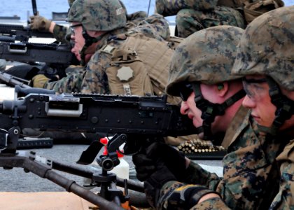 US Navy 101006-N-8113T-012 Marines participate in an M-240 machine gun qualification aboard USS Denver (LPD 9)