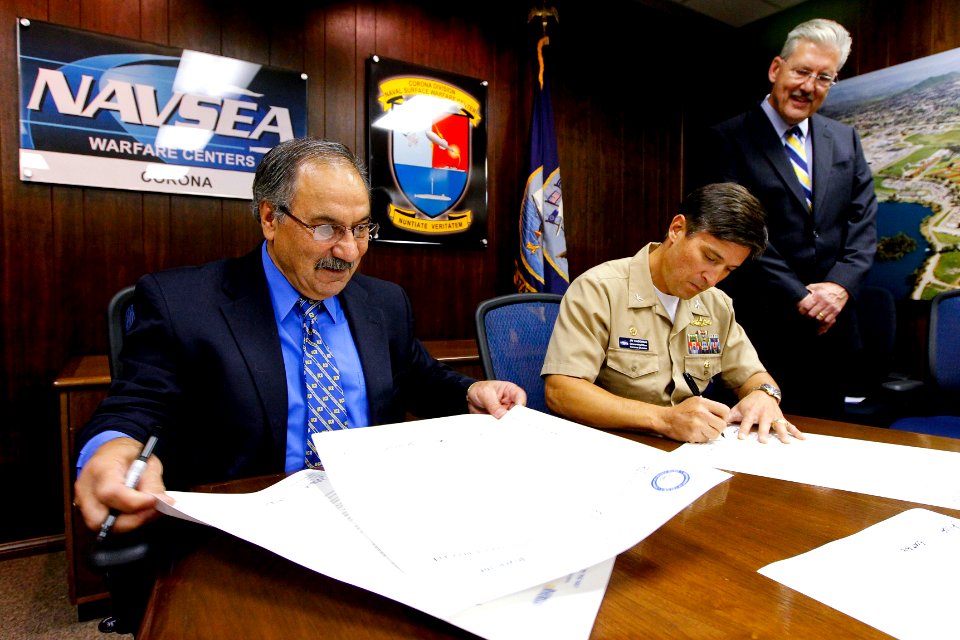 US Navy 101006-N-8863V-428 Capt. Jay Kadowaki, right, commanding officer of Naval Surface Warfare Center (NSWC), Corona Division, and Dean Reza Abb