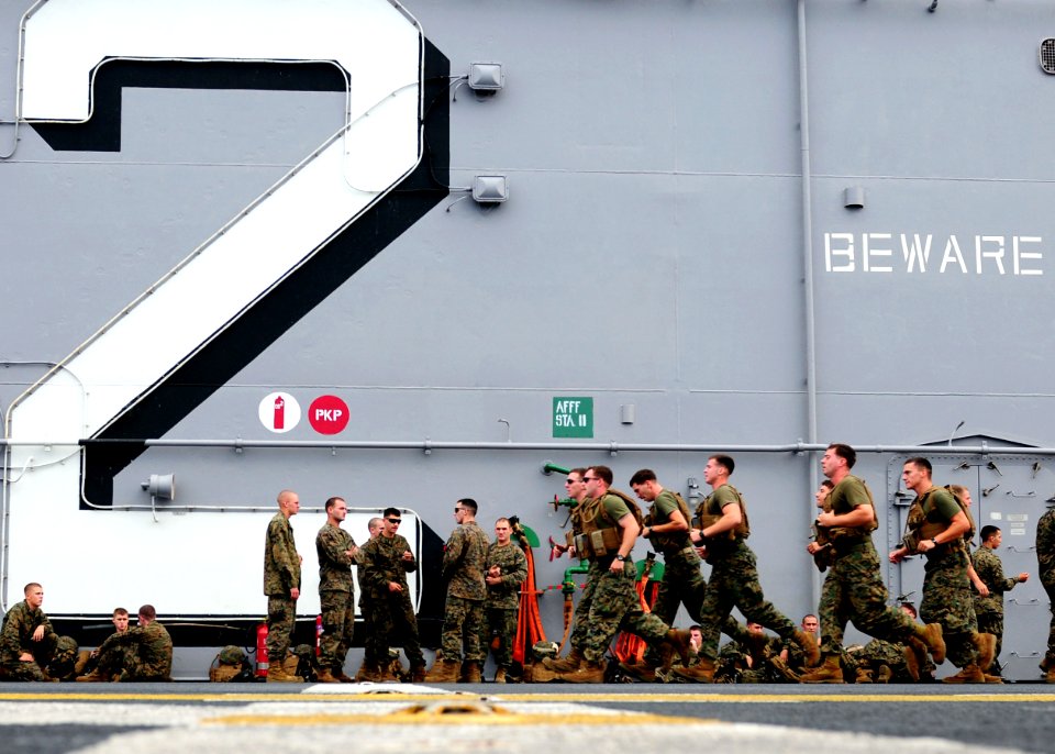 US Navy 101006-N-5538K-042 Marines assigned to the 31st Marine Expeditionary Unit (31st MEU) exercise on the flight deck of the forward-deployed am