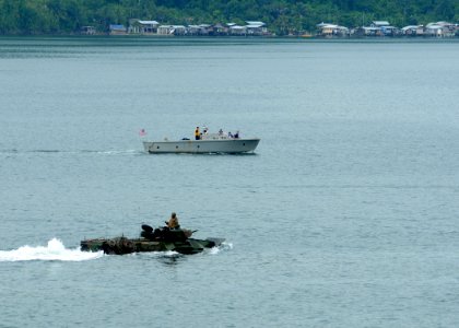 US Navy 101005-N-7680E-071 An amphibious assault vehicle (AAV) assigned to Alpha Company of the 2nd Assault Amphibian Battalion transits away from