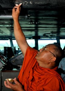 US Navy 101006-N-7103C-099 A Buddhist monk from the Wat Jitapawan Temple blesses the bridge of the aircraft carrier USS George Washington (CVN 73) photo