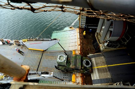 US Navy 101012-N-8335D-281 A Humvee assigned to the 31st Marine Expeditionary Unit (31st MEU) backs onto Landing Craft Utility (LCU) 1627