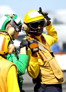 US Navy 101009-N-3374C-090 Sailors communicate during a mass casualty drill on the flight deck of the aircraft carrier USS George H.W. Bush (CVN 77