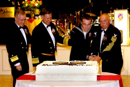 US Navy 101009-N-3822F-001 Official cake cutting ceremony during the Naval Personnel Command (NPC) Navy Ball photo