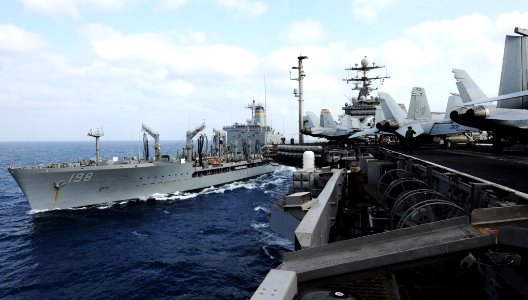 US Navy 101013-N-6362C-083 The Military Sealift Command fleet replenishment oiler USNS Big Horn (T-AO 198) transits alongside the aircraft carrier
