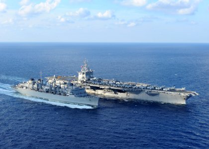 US Navy 101014-N-5082P-215 The aircraft carrier USS Enterprise (CVN 65) and the Military Sealift Command fast combat supply ship USNS Arctic (T-AOE