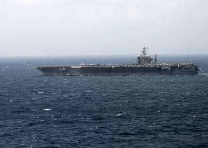 US Navy 101014-N-5016P-500 An F-A-18 Hornet launches from the aircraft carrier USS Abraham Lincoln (CVN 72)
