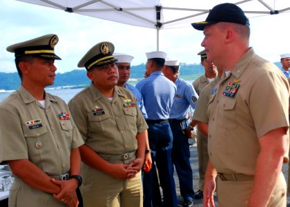 US Navy 101016-N-3589B-020 Cmdr. Troy Amundson, right, speaks with members of the Philippine navy before a closing ceremony for Cooperation Afloat