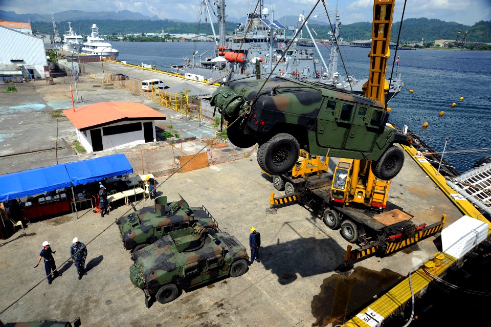 US Navy 101016-N-8335D-835 A Humvee assigned to the 31st Marine Expeditionary Unit (31st MEU) being craned aboard the amphibious dock landing ship