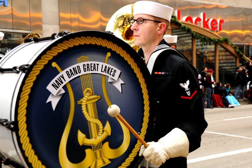 US Navy 111124-N-CD297-024 Musician 3rd Class Jonah David, from South Orange, N.J., a member of the U.S. Navy Band Great Lakes, keeps the beat on a