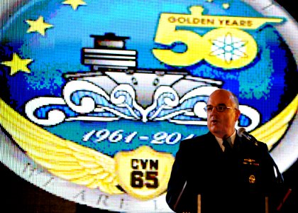 US Navy 111128-N-NY820-076 Adm. John C. Harvey Jr., commander of U.S. Fleet Forces, speaks in the hangar bay of the aircraft carrier USS Enterprise photo