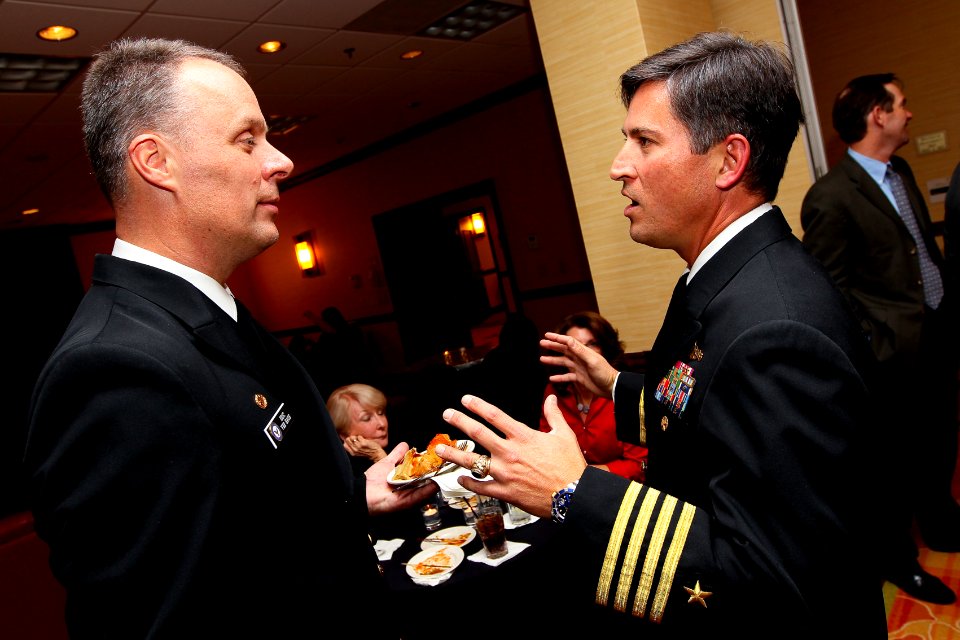 US Navy 111129-N-HW977-243 Cmdr. Eric Ver Hage, the newly appointed Naval Surface Warfare Center (NSWC), Corona Division commanding officer, left,