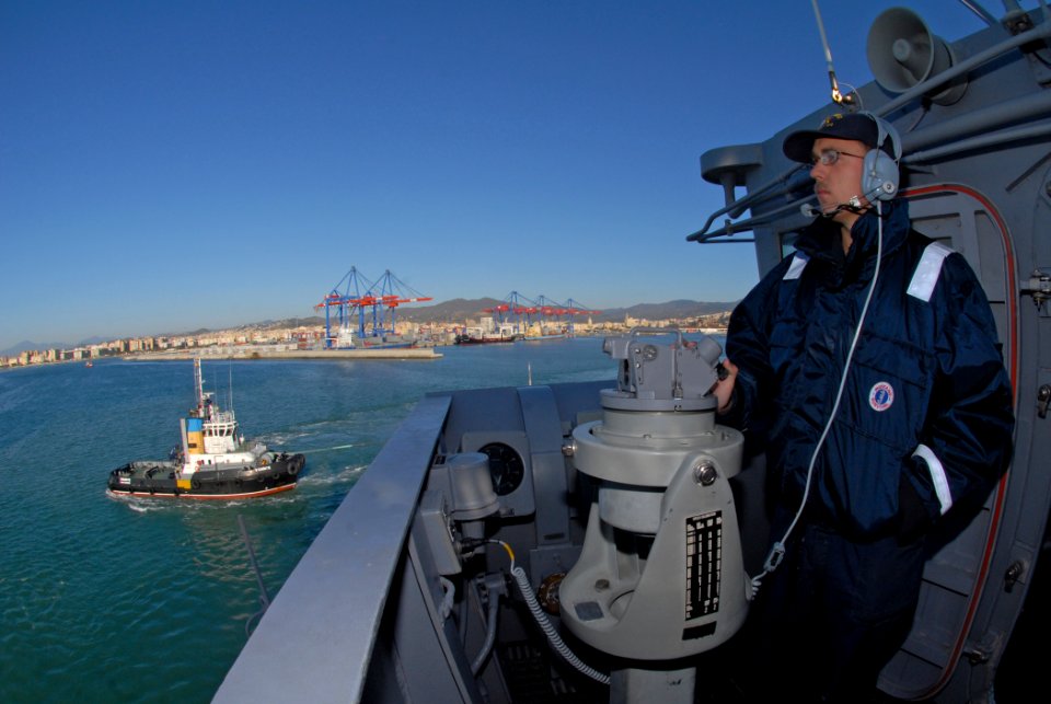 US Navy 111128-N-DU438-155 Quartermaster Seaman William Broerman stands a bearing watch aboard the guided-missile cruiser USS Gettysburg (CG 64) as