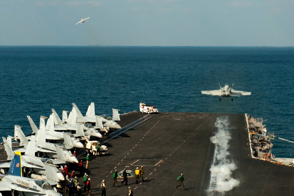 US Navy 111125-N-BT887-028 n F-A-18E Super Hornet assigned to the Tophatters of Strike Fighter Squadron (VFA) 14 launches from the Nimitz-class air