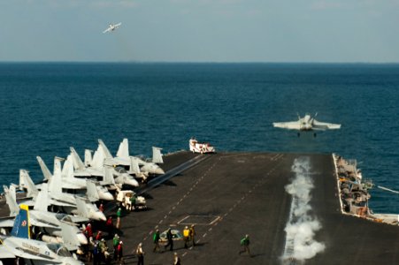 US Navy 111125-N-BT887-028 n F-A-18E Super Hornet assigned to the Tophatters of Strike Fighter Squadron (VFA) 14 launches from the Nimitz-class air