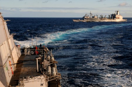US Navy 111130-N-XQ375-310 he guided-missile destroyer USS Mitscher (DDG 57) breaks away from the guided-missile cruiser USS Anzio (CG 68) and the